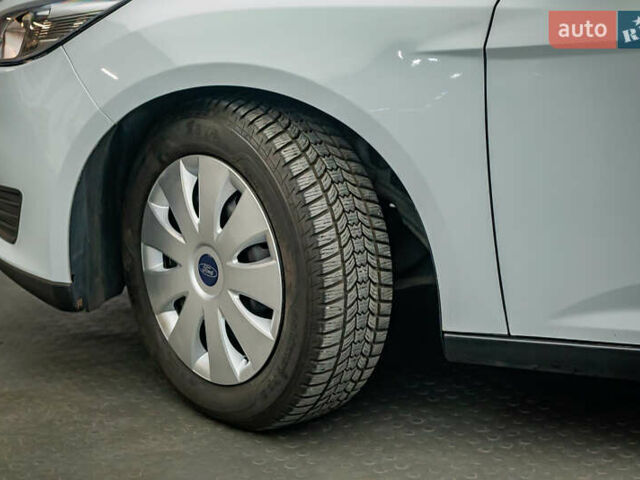 Білий Форд Фокус, об'ємом двигуна 1 л та пробігом 88 тис. км за 9788 $, фото 7 на Automoto.ua