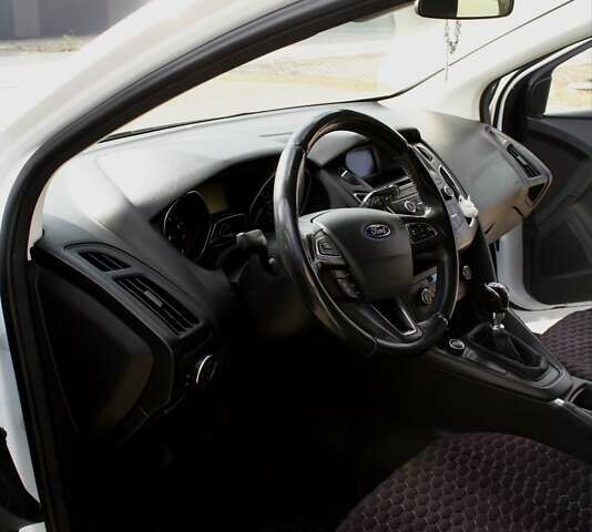 Белый Форд Фокус, объемом двигателя 1 л и пробегом 115 тыс. км за 9000 $, фото 22 на Automoto.ua