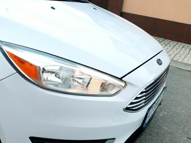 Білий Форд Фокус, об'ємом двигуна 2 л та пробігом 161 тис. км за 7469 $, фото 23 на Automoto.ua
