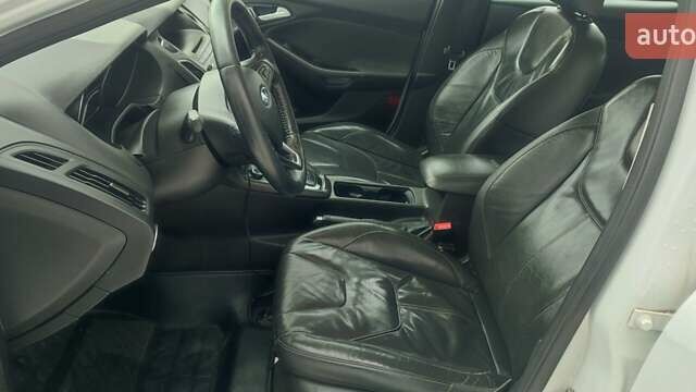 Білий Форд Фокус, об'ємом двигуна 2 л та пробігом 162 тис. км за 8999 $, фото 13 на Automoto.ua