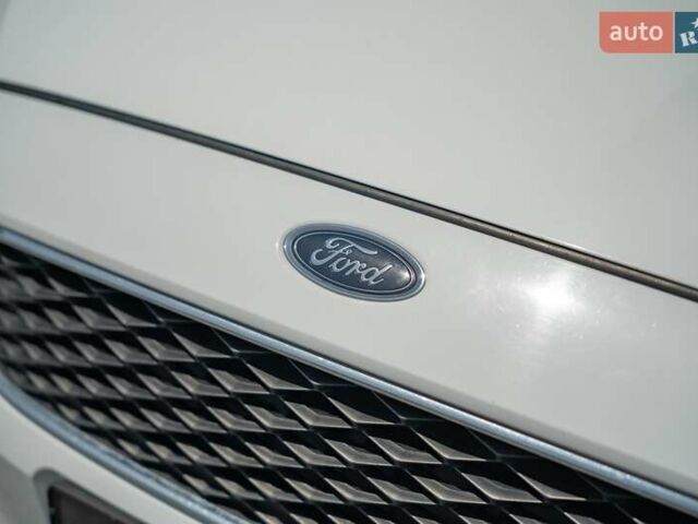 Белый Форд Фокус, объемом двигателя 1 л и пробегом 191 тыс. км за 8700 $, фото 13 на Automoto.ua