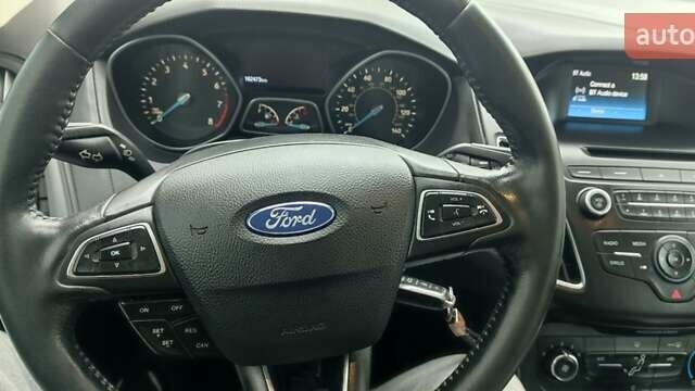 Білий Форд Фокус, об'ємом двигуна 2 л та пробігом 162 тис. км за 8999 $, фото 6 на Automoto.ua