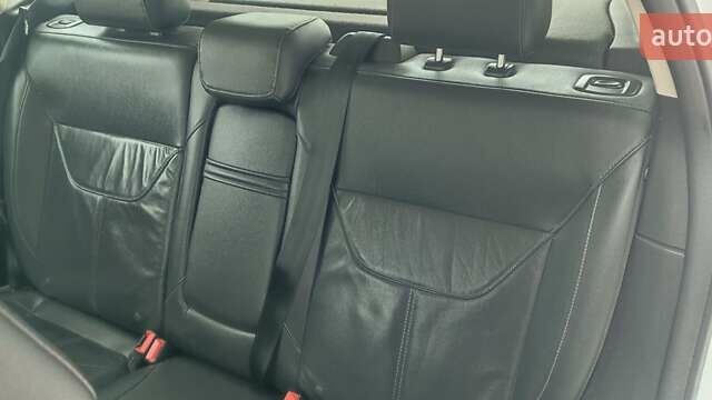 Білий Форд Фокус, об'ємом двигуна 2 л та пробігом 162 тис. км за 8999 $, фото 18 на Automoto.ua