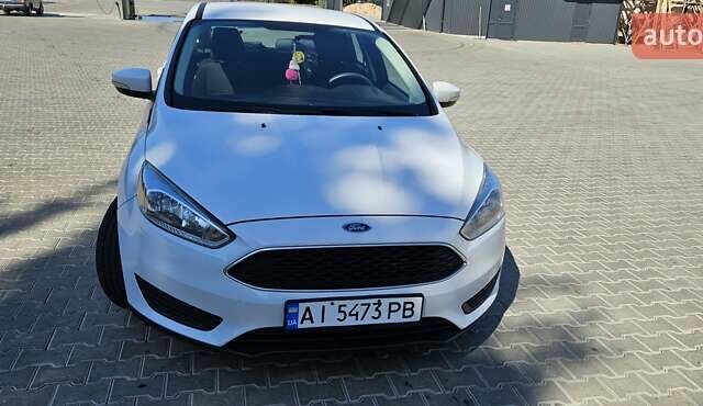 Белый Форд Фокус, объемом двигателя 2 л и пробегом 213 тыс. км за 8999 $, фото 8 на Automoto.ua