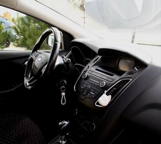 Белый Форд Фокус, объемом двигателя 1 л и пробегом 115 тыс. км за 9000 $, фото 24 на Automoto.ua