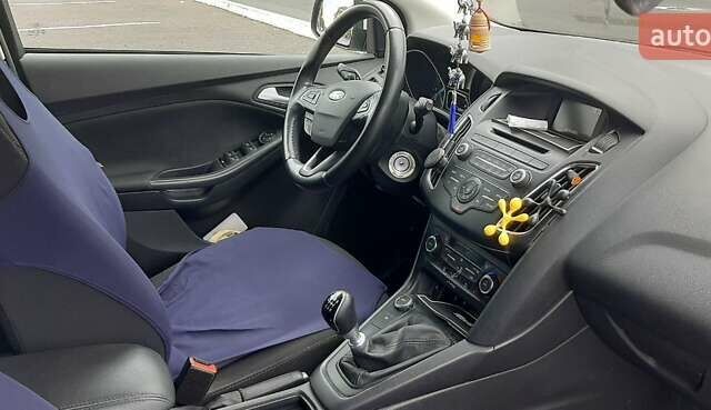 Белый Форд Фокус, объемом двигателя 1 л и пробегом 100 тыс. км за 8500 $, фото 1 на Automoto.ua