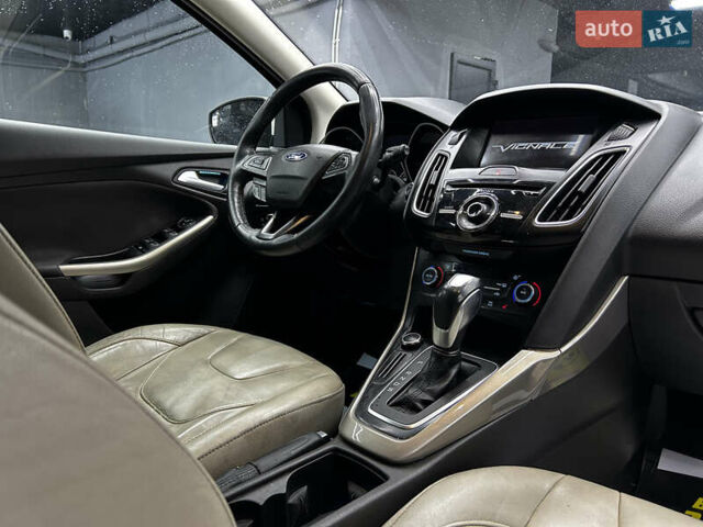 Білий Форд Фокус, об'ємом двигуна 2 л та пробігом 177 тис. км за 8700 $, фото 16 на Automoto.ua