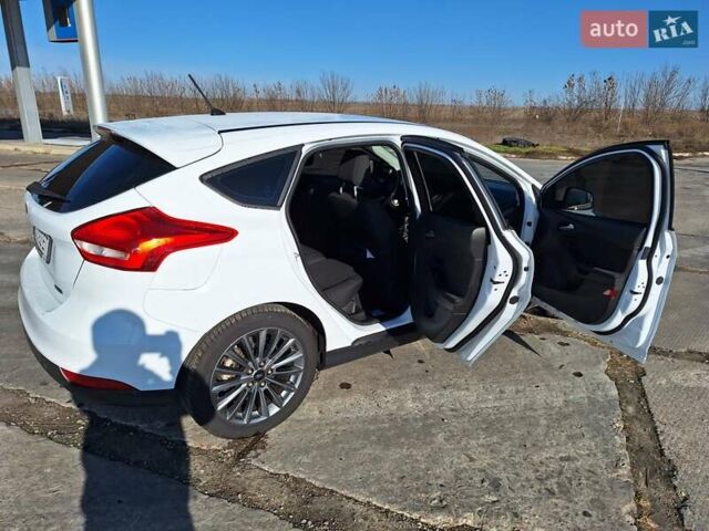 Білий Форд Фокус, об'ємом двигуна 1 л та пробігом 98 тис. км за 9600 $, фото 5 на Automoto.ua