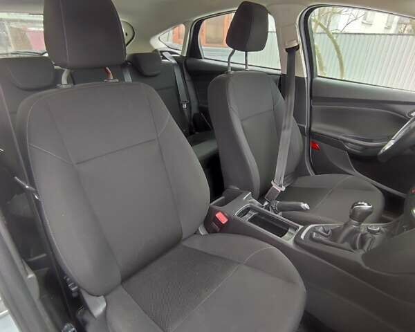 Белый Форд Фокус, объемом двигателя 1 л и пробегом 132 тыс. км за 6900 $, фото 11 на Automoto.ua