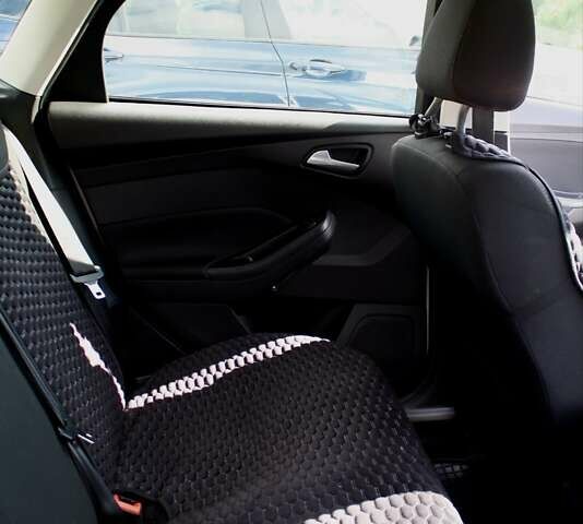 Белый Форд Фокус, объемом двигателя 1 л и пробегом 115 тыс. км за 9000 $, фото 19 на Automoto.ua