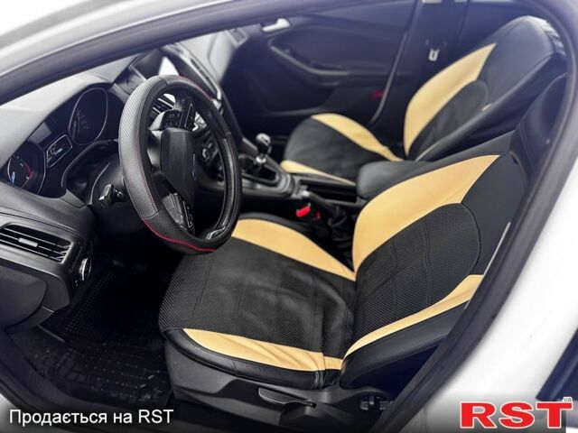 Белый Форд Фокус, объемом двигателя 1.5 л и пробегом 211 тыс. км за 9800 $, фото 2 на Automoto.ua