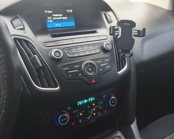 Белый Форд Фокус, объемом двигателя 1.5 л и пробегом 216 тыс. км за 9500 $, фото 13 на Automoto.ua