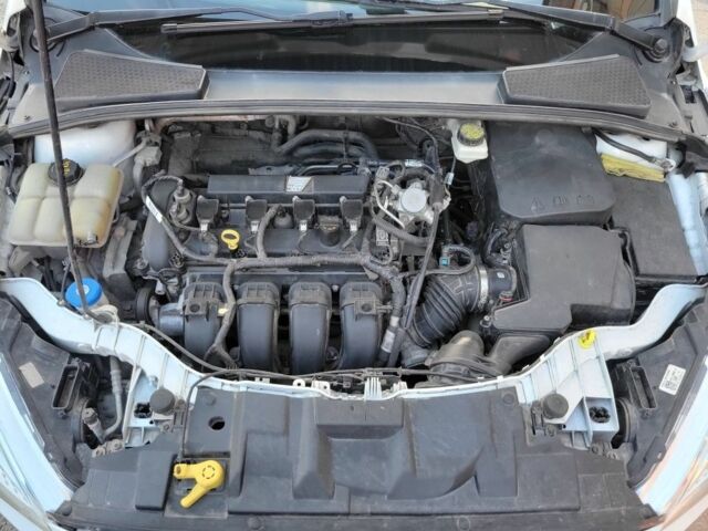 Белый Форд Фокус, объемом двигателя 2 л и пробегом 130 тыс. км за 8200 $, фото 7 на Automoto.ua