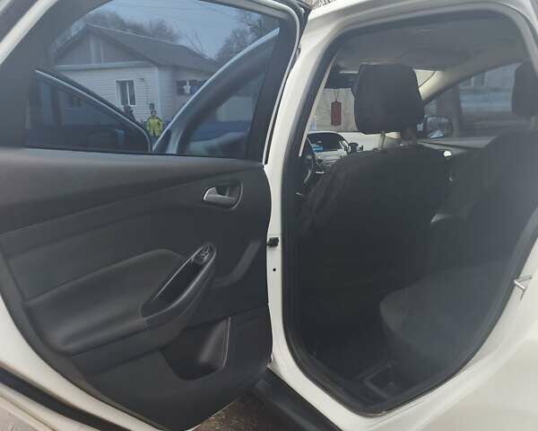 Белый Форд Фокус, объемом двигателя 1.5 л и пробегом 216 тыс. км за 9500 $, фото 11 на Automoto.ua