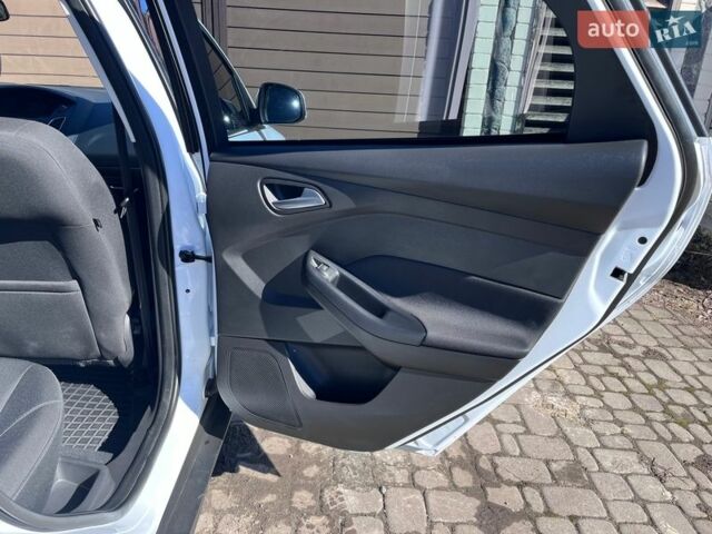 Білий Форд Фокус, об'ємом двигуна 1.6 л та пробігом 58 тис. км за 9400 $, фото 19 на Automoto.ua