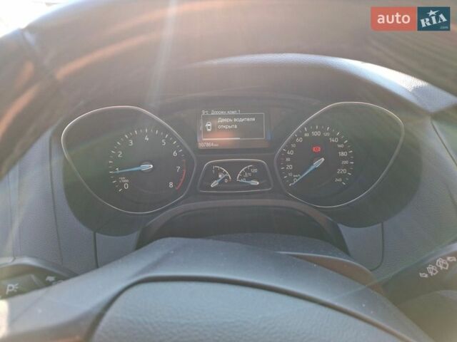 Белый Форд Фокус, объемом двигателя 1 л и пробегом 108 тыс. км за 9500 $, фото 13 на Automoto.ua