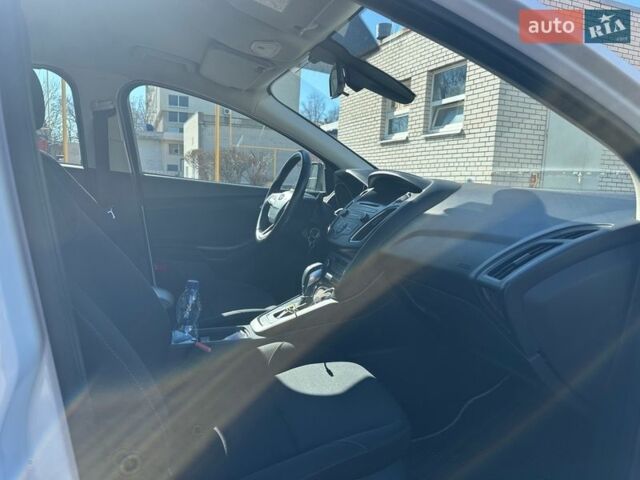 Білий Форд Фокус, об'ємом двигуна 1 л та пробігом 93 тис. км за 11100 $, фото 9 на Automoto.ua