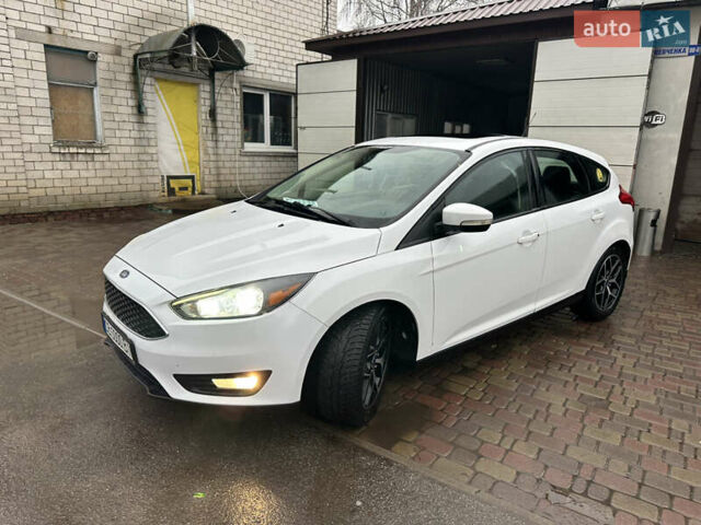 Білий Форд Фокус, об'ємом двигуна 2 л та пробігом 154 тис. км за 8700 $, фото 27 на Automoto.ua