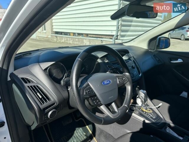 Білий Форд Фокус, об'ємом двигуна 1 л та пробігом 93 тис. км за 11100 $, фото 6 на Automoto.ua