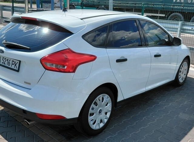 Белый Форд Фокус, объемом двигателя 1.5 л и пробегом 167 тыс. км за 7600 $, фото 2 на Automoto.ua