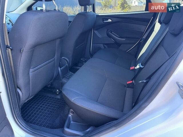 Білий Форд Фокус, об'ємом двигуна 1.6 л та пробігом 58 тис. км за 9400 $, фото 16 на Automoto.ua