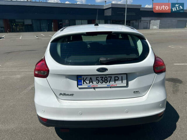 Белый Форд Фокус, объемом двигателя 2 л и пробегом 71 тыс. км за 13365 $, фото 4 на Automoto.ua