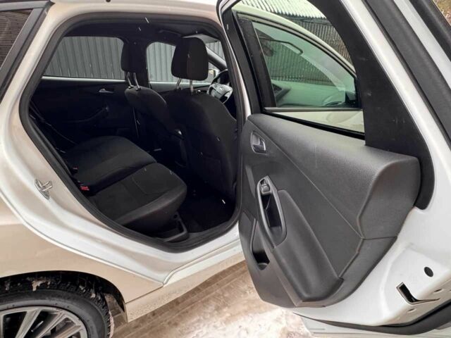 Білий Форд Фокус, об'ємом двигуна 1.5 л та пробігом 223 тис. км за 11800 $, фото 9 на Automoto.ua