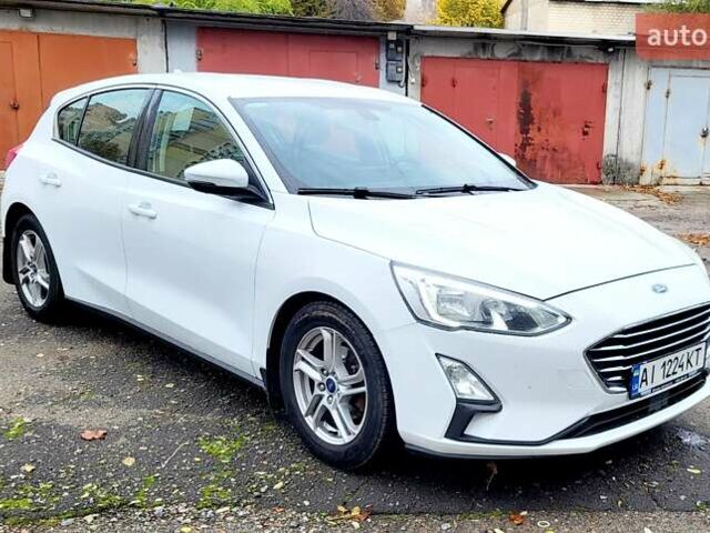 Белый Форд Фокус, объемом двигателя 1.5 л и пробегом 155 тыс. км за 12900 $, фото 1 на Automoto.ua
