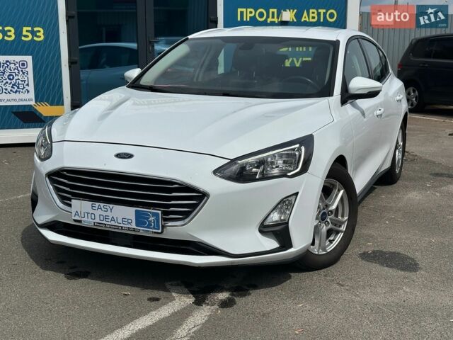 Белый Форд Фокус, объемом двигателя 1.5 л и пробегом 159 тыс. км за 11990 $, фото 1 на Automoto.ua