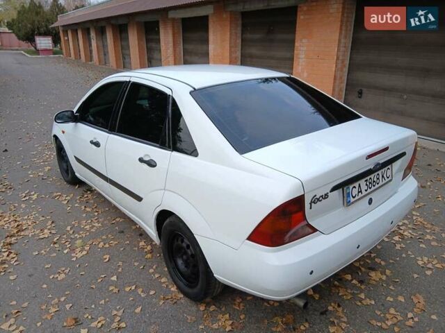 Белый Форд Фокус, объемом двигателя 1.6 л и пробегом 405 тыс. км за 2299 $, фото 2 на Automoto.ua