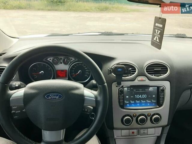 Белый Форд Фокус, объемом двигателя 1.6 л и пробегом 187 тыс. км за 5750 $, фото 17 на Automoto.ua