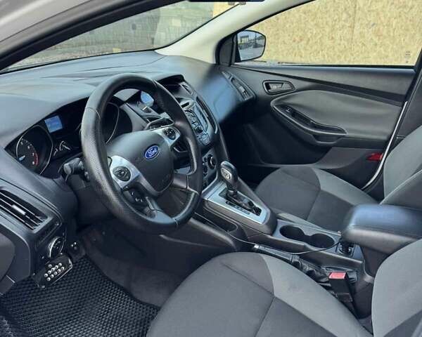 Белый Форд Фокус, объемом двигателя 2 л и пробегом 235 тыс. км за 5999 $, фото 7 на Automoto.ua