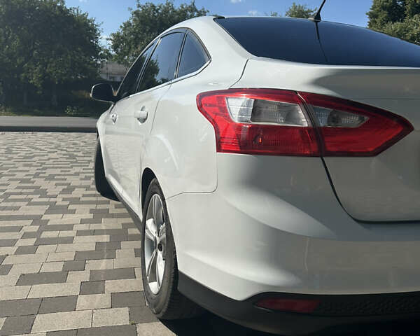 Белый Форд Фокус, объемом двигателя 1.6 л и пробегом 201 тыс. км за 6750 $, фото 2 на Automoto.ua