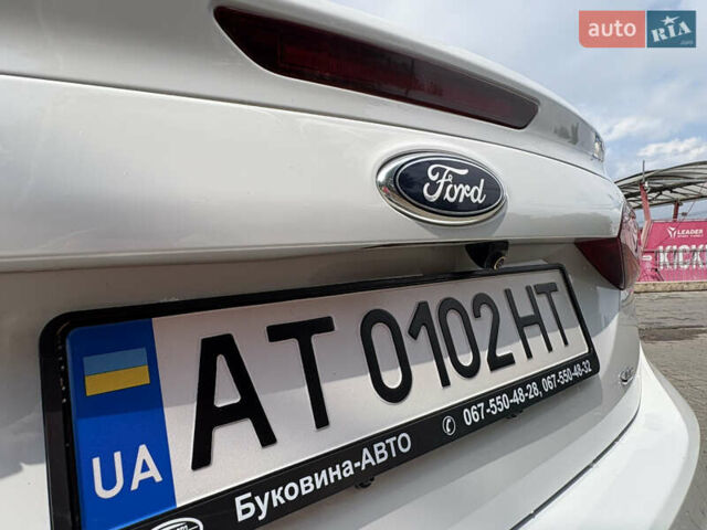 Белый Форд Фокус, объемом двигателя 2 л и пробегом 236 тыс. км за 6999 $, фото 6 на Automoto.ua