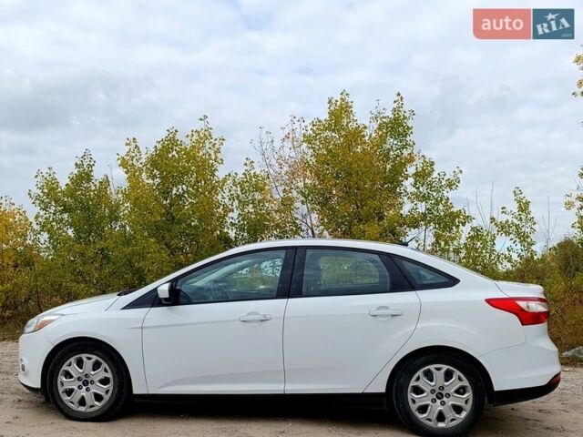 Білий Форд Фокус, об'ємом двигуна 2 л та пробігом 217 тис. км за 6400 $, фото 6 на Automoto.ua
