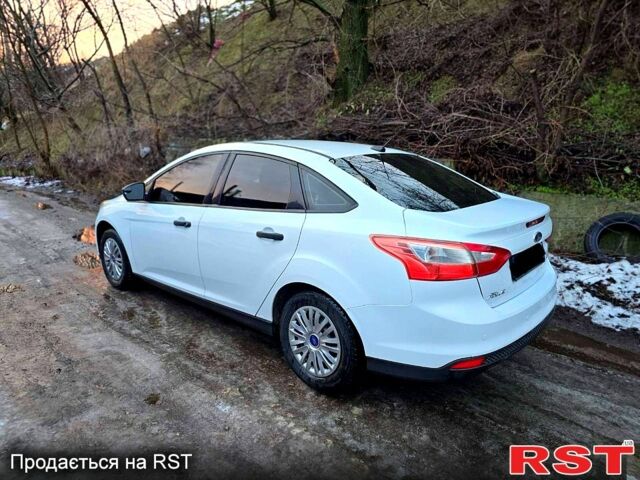 Білий Форд Фокус, об'ємом двигуна 2 л та пробігом 150 тис. км за 5990 $, фото 7 на Automoto.ua