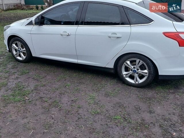 Белый Форд Фокус, объемом двигателя 1.6 л и пробегом 140 тыс. км за 8200 $, фото 1 на Automoto.ua