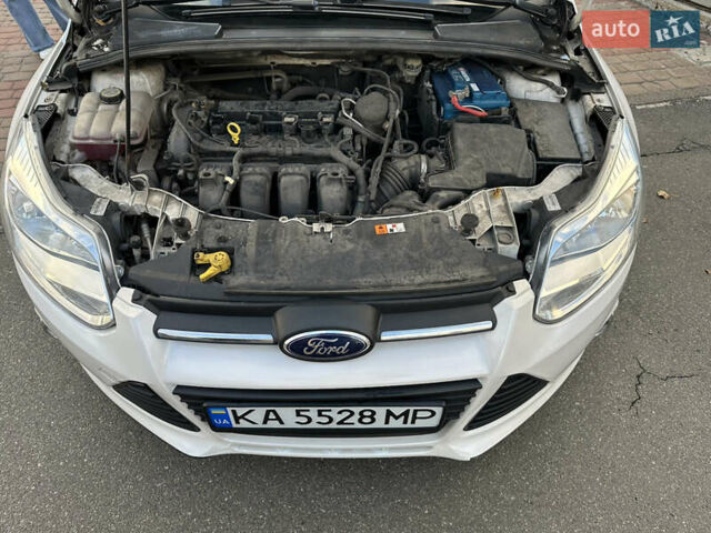 Белый Форд Фокус, объемом двигателя 2 л и пробегом 190 тыс. км за 5900 $, фото 19 на Automoto.ua