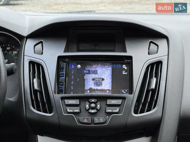 Белый Форд Фокус, объемом двигателя 2 л и пробегом 164 тыс. км за 6800 $, фото 19 на Automoto.ua