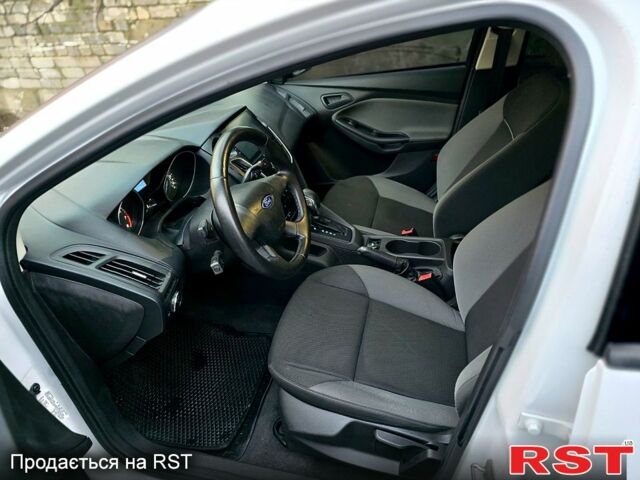 Білий Форд Фокус, об'ємом двигуна 2 л та пробігом 150 тис. км за 5990 $, фото 11 на Automoto.ua