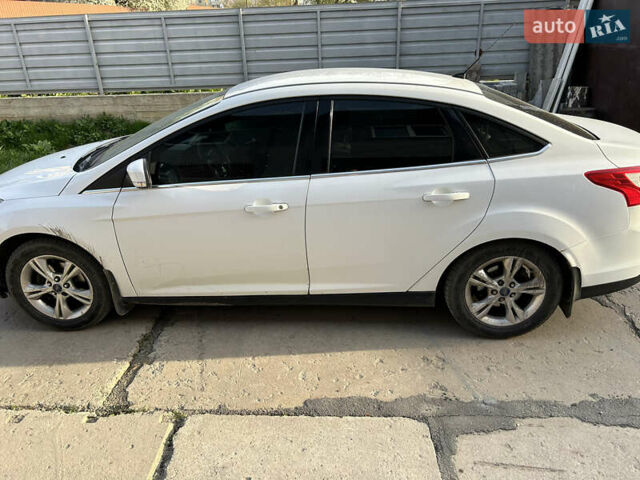 Белый Форд Фокус, объемом двигателя 1.6 л и пробегом 244 тыс. км за 7099 $, фото 1 на Automoto.ua
