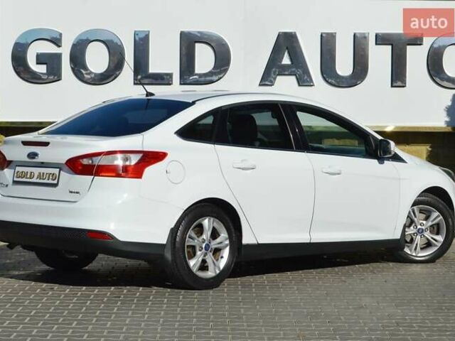 Белый Форд Фокус, объемом двигателя 1 л и пробегом 234 тыс. км за 5950 $, фото 12 на Automoto.ua