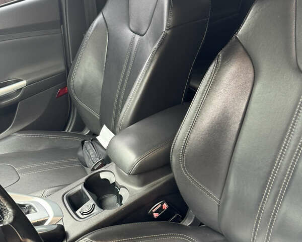 Форд Фокус 2013 у Сумах на Automoto.ua Білий Форд Фокус, об'ємом двигуна 2 л та пробігом 188 тис. км за 8000 $, фото 6 на Automoto.ua