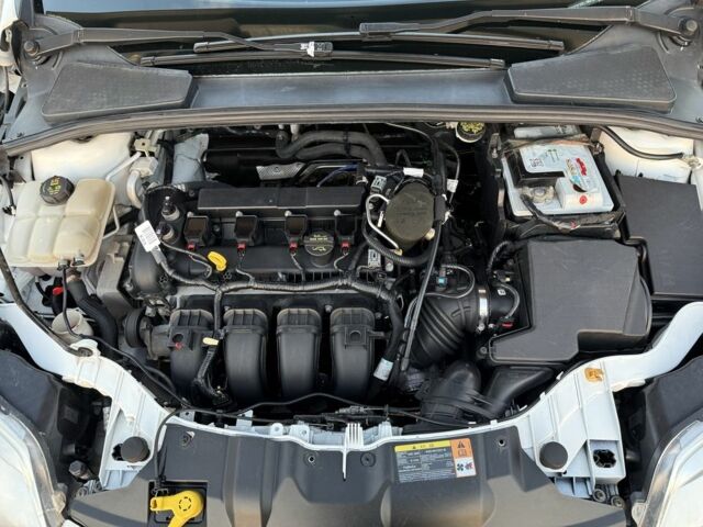 Білий Форд Фокус, об'ємом двигуна 2 л та пробігом 189 тис. км за 6799 $, фото 4 на Automoto.ua