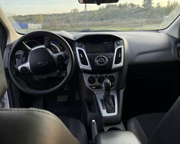 Белый Форд Фокус, объемом двигателя 2 л и пробегом 304 тыс. км за 7599 $, фото 4 на Automoto.ua