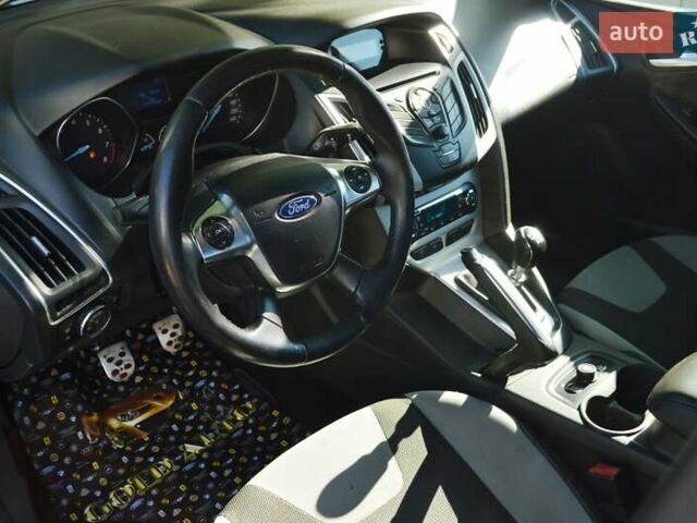 Белый Форд Фокус, объемом двигателя 1 л и пробегом 234 тыс. км за 5950 $, фото 14 на Automoto.ua