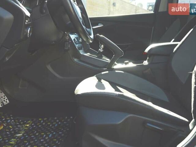 Белый Форд Фокус, объемом двигателя 1 л и пробегом 234 тыс. км за 5950 $, фото 15 на Automoto.ua