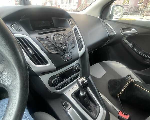 Белый Форд Фокус, объемом двигателя 1 л и пробегом 159 тыс. км за 6500 $, фото 9 на Automoto.ua