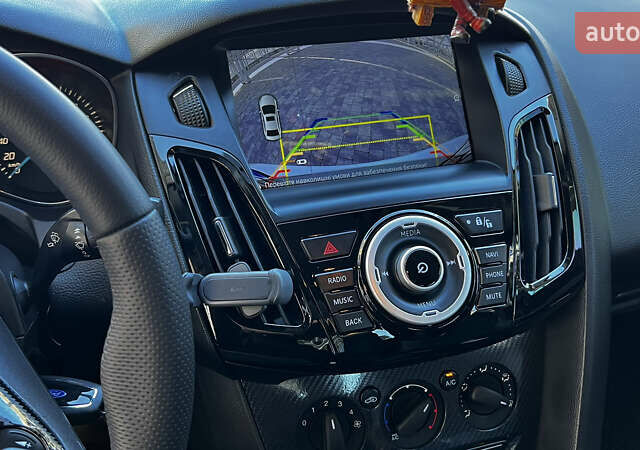 Білий Форд Фокус, об'ємом двигуна 1 л та пробігом 131 тис. км за 8500 $, фото 13 на Automoto.ua