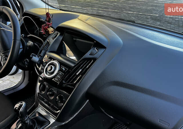 Білий Форд Фокус, об'ємом двигуна 1 л та пробігом 131 тис. км за 8500 $, фото 12 на Automoto.ua